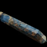 Detailed view of the damascus steel blade's unique pattern, highlighting the exquisite craftsmanship of the Thelchtereia paring knife.