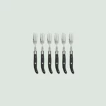 Close-up of Laguiole steak fork with wood handle and polished bolster