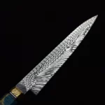 Thelchtereia paring knife in action. Handmade Chef Knives