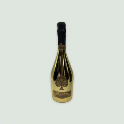 Front view of Armand De Brignac Brut Gold Champagne bottle, showing its iconic golden design and Ace of Spades logo.