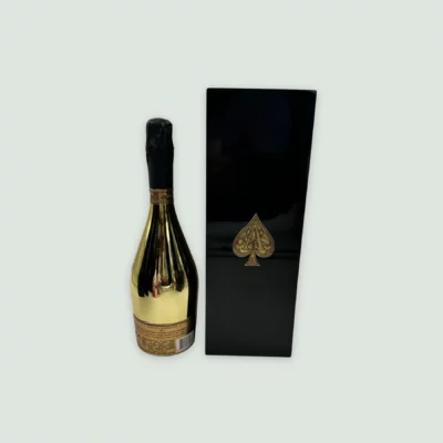 Back view of the Armand De Brignac Brut Gold Champagne bottle, featuring detailed label information and the luxurious gold finish.