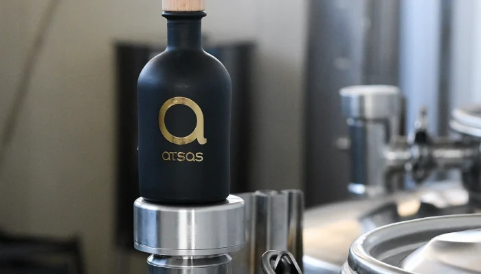 Atsas Olive Oil team showcasing cold extraction techniques to maintain purity and flavor. Atsas Olive Oil team showcasing cold extraction techniques to maintain purity and flavor.