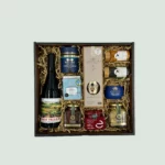 a gift box with luxury gourmet gift box with fine products like Marfuga olive specialties, Nobleza del Sur EVOO, Ribera del Duero wine, and Ikaria herbal tea. Customizable and shipped worldwide via DHL Express