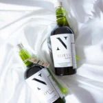 Close-up of El Más Verde Novo cold pressed extra virgin olive oil in a green 500ml bottle