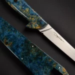 Close-up view of the 155 mm powder metallurgy stainless steel blade of the Leukothea Boning Knife