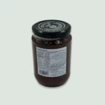 Back view of Geodi Fig Jam jar featuring detailed product information and company details.