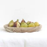 A plate of fresh figs, highlighting their vibrant colors and natural texture, perfect for pairing with fig jam.