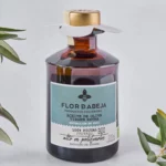 Early harvest Flor de Abeja Picual extra virgin olive oil showcasing premium organic Picual olives