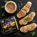 Royal Goose Liver Pate served on rustic bread with herbs,