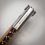High-end sommelier corkscrew with engraved lever and elegant design