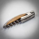Close-up of olive wood handle on Claude Dozorme