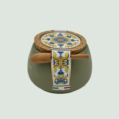 Italian Sea Salt Fior di Sale Italia in olive green ceramic pot with spoon - side view