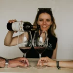 Pouring Rioja red wine into a glass