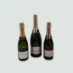 Moët Rosé Impérial Champagne bottle displayed alongside Moët Impérial Champagne bottle.