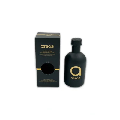 Close-up of the Atsas Gold Limited Edition olive oil bottle showcasing its premium gold label and organic product packaging.