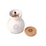 Organic extra virgin olive oil in handcrafted ceramic bottle with cork top