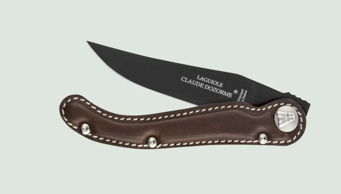 Claude Dozorme knife with black Teflon-coated blade and brown leather handle Claude Dozorme knife with black Teflon-coated blade and brown leather handle