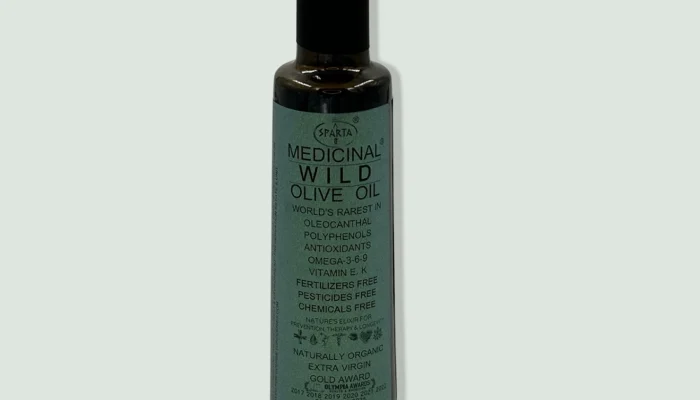 Bottle of Sparta Green Medicinal Olive Oil Bottle of Sparta Green Medicinal Olive Oil, showcasing its premium quality and organic certification, with a label emphasizing its natural production methods and health benefits.