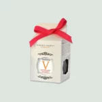 Vasilissa Wildforest Honey displayed alongside its beautifully designed box, emphasizing the premium quality and elegant presentation.