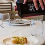 Verde Esmeralda Red Diamond extra virgin olive oil in luxury red diamond-shaped bottle