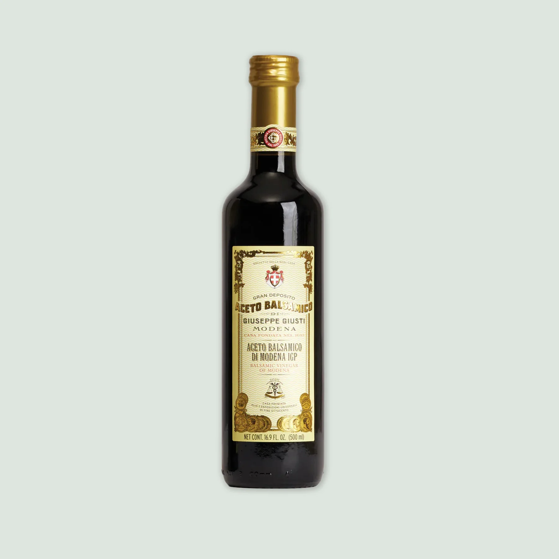 Front view of Giusti Balsamic Vinegar of Modena Bordolese 500ml bottle with classic label design. Front view of Giusti Balsamic Vinegar of Modena Bordolese 500ml bottle with classic label design.