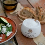 Gift-ready ceramic jar with wooden spoon and natural salt