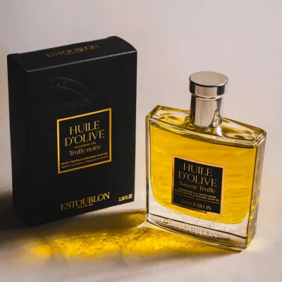 Close-up of gourmet truffle oil spray bottle detail