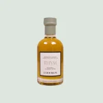 Thyme-infused olive oil bottle with delicate herbal notes and aromatic Mediterranean essence