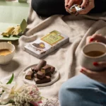 Laurence Kunefe pistachio chocolate bar served with a cup of tea, perfect for an indulgent treat or sophisticated gift