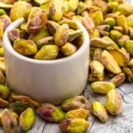 High-quality pistachios used in Laurence Galerie De Chocolat's Kunefe chocolate bar, adding a rich, nutty flavor.
