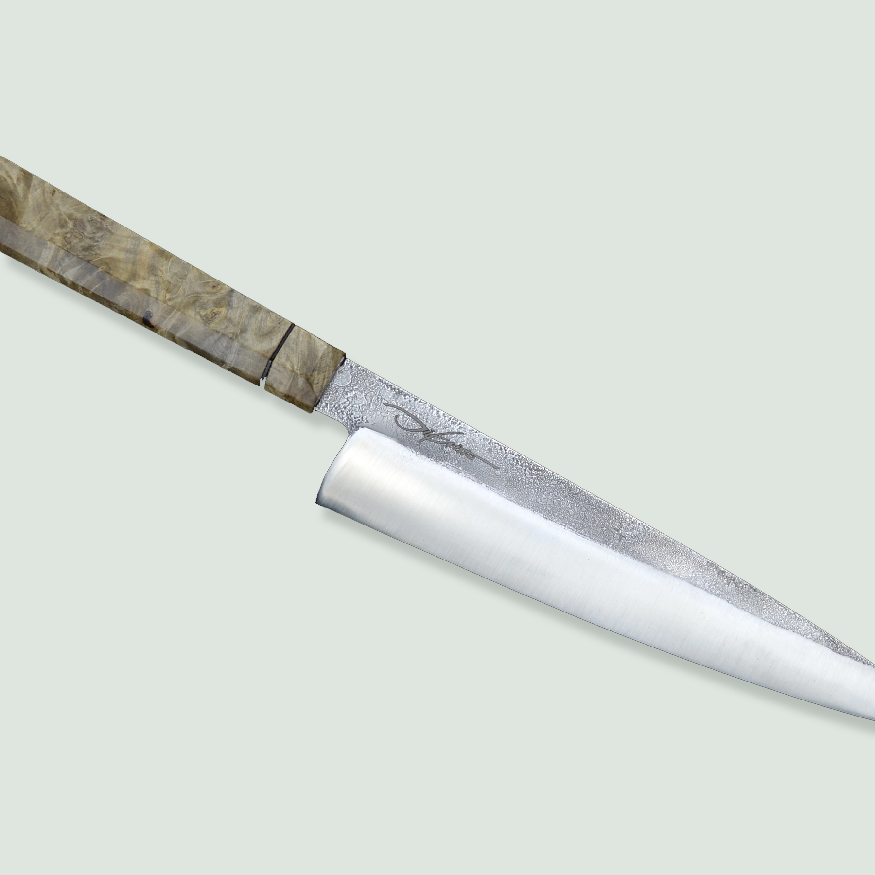 Handmade Pandion Gyuto Knife Handmade Pandion Gyuto knife with a high-carbon steel blade and ergonomic handle.