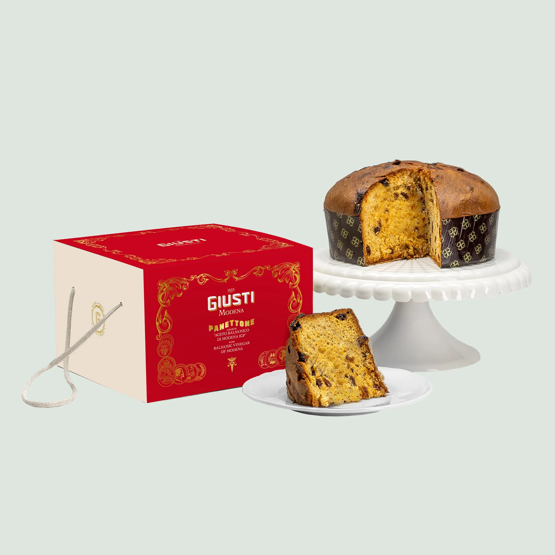 1kg Giusti Panettone cake wrapped in premium packaging with branded label. 1kg Giusti Panettone cake wrapped in premium packaging with branded label.