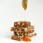 Clean ingredient energy bar with organic honey, strawberries, and blueberries
