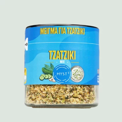 Glass jar of Tzatziki Mix with dried herbs inside
